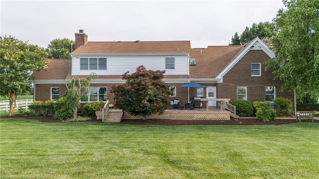1040 Sanderson Rd, Chesapeake, VA 23322 - rear view of property featuring a wooden deck, a chimney, and brick siding