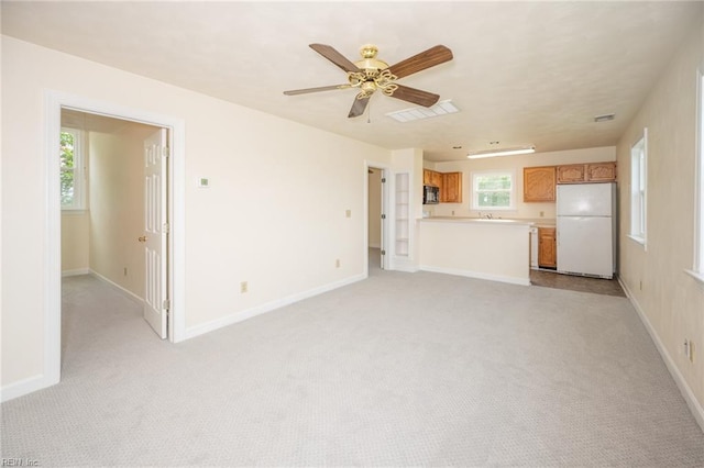 1040 Sanderson Rd, Chesapeake, VA 23322 - unfurnished living room featuring light carpet and a ceiling fan