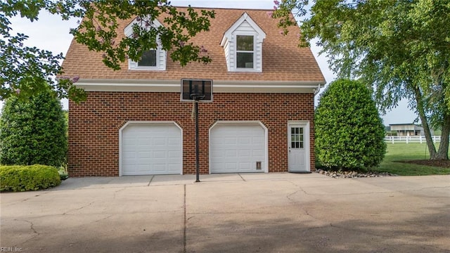 1040 Sanderson Rd, Chesapeake, VA 23322 - view of front facade featuring driveway, an attached garage, and brick siding