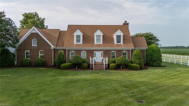 1040 Sanderson Rd, Chesapeake, VA 23322 - cape cod-style house with a chimney and brick siding