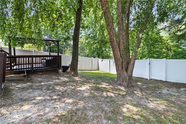 114 Lancelot Dr, Suffolk, VA 23434 - fenced backyard with a gazebo and a wooden deck
