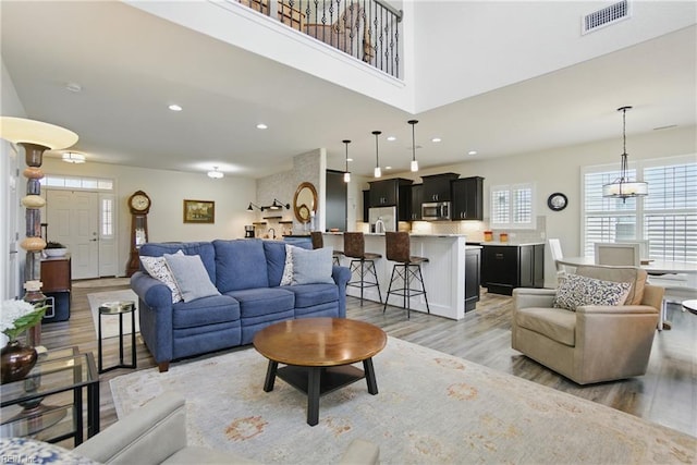 1041 Whitburn Ter, Chesapeake, VA 23322 - living room with light wood finished floors and recessed lighting