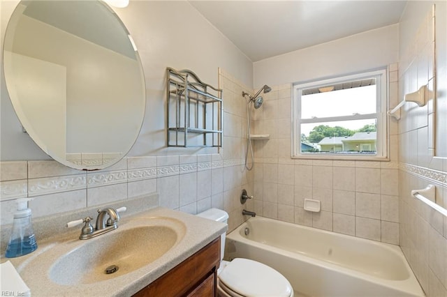 5813 Andrea Dr, Norfolk, VA 23518 - bathroom with tile walls, vanity, washtub / shower combination, and tasteful backsplash