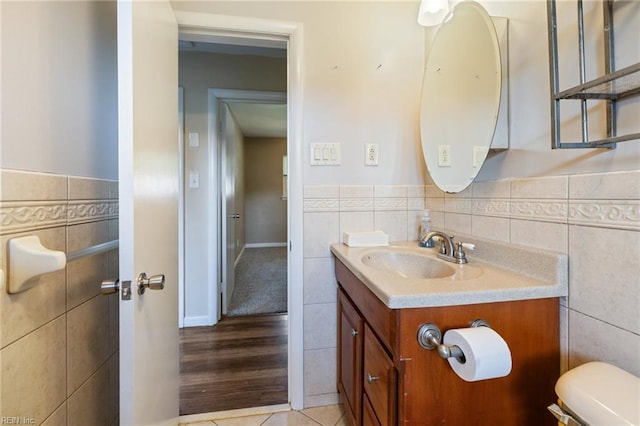 5813 Andrea Dr, Norfolk, VA 23518 - bathroom with tile walls, vanity, wainscoting, and tile patterned floors