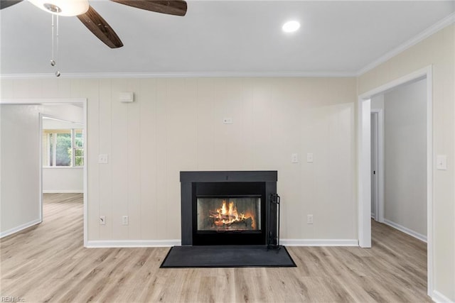 2001 Blackwell Ct, Virginia Beach, VA 23464 - detailed view of wood finished floors, ornamental molding, a ceiling fan, and a glass covered fireplace