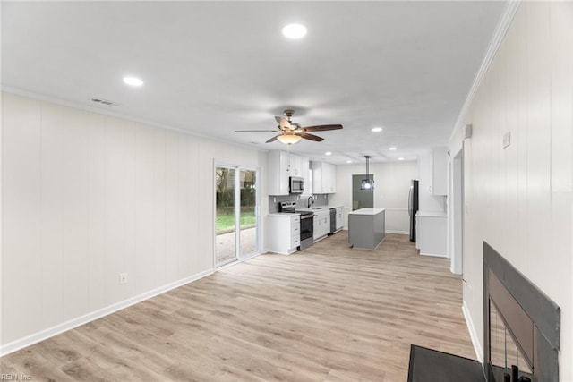 2001 Blackwell Ct, Virginia Beach, VA 23464 - unfurnished living room featuring crown molding, a ceiling fan, light wood-type flooring, and recessed lighting