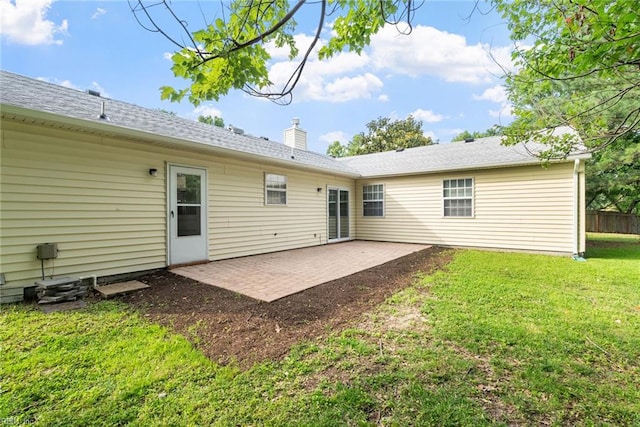 2001 Blackwell Ct, Virginia Beach, VA 23464 - back of house featuring a patio area, a yard, and a chimney