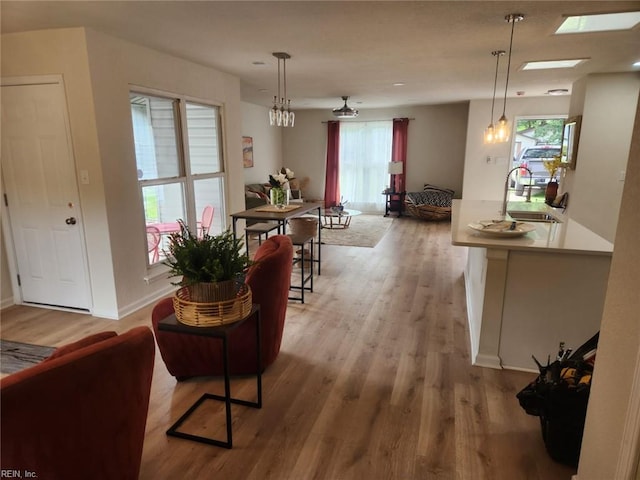 13031 Green Grove Ln, Newport News, VA 23608 - living room featuring light wood-type flooring and plenty of natural light