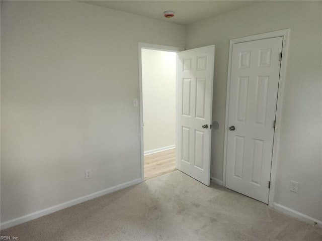 13031 Green Grove Ln, Newport News, VA 23608 - unfurnished bedroom featuring carpet flooring and baseboards