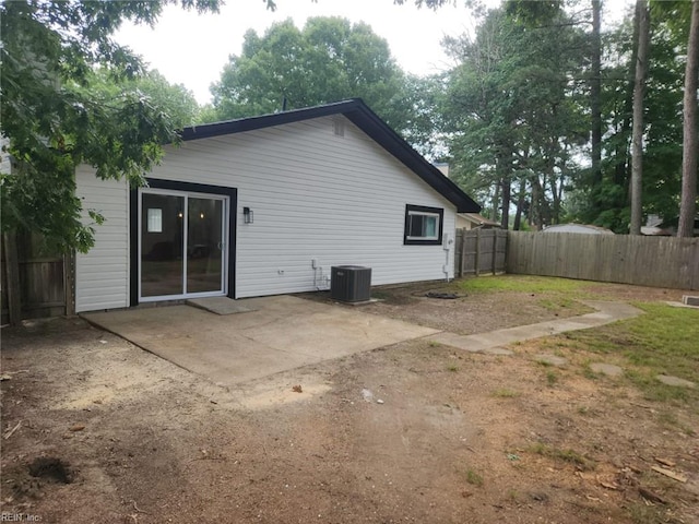 13031 Green Grove Ln, Newport News, VA 23608 - rear view of house with a fenced backyard and a patio