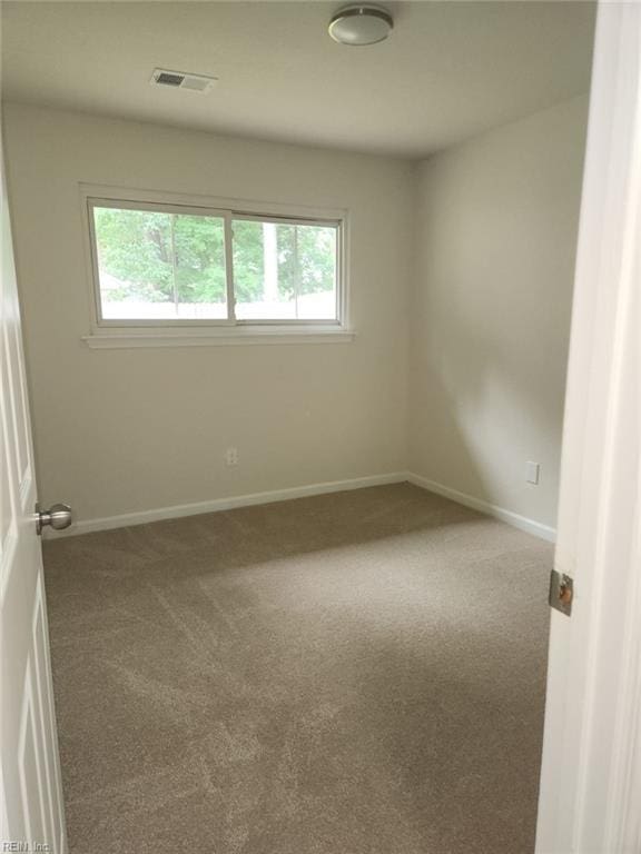 13031 Green Grove Ln, Newport News, VA 23608 - carpeted spare room featuring baseboards