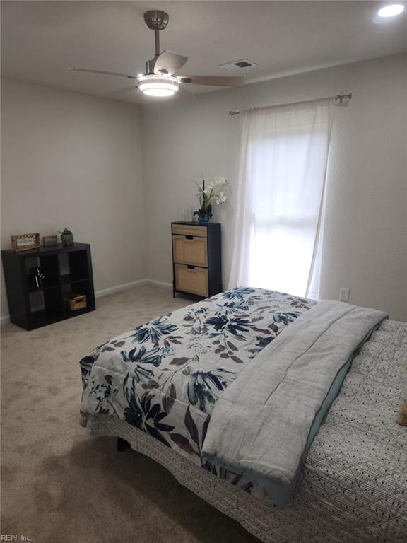 13031 Green Grove Ln, Newport News, VA 23608 - bedroom with carpet flooring and ceiling fan
