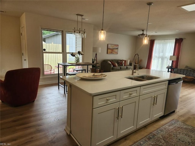 13031 Green Grove Ln, Newport News, VA 23608 - kitchen with open floor plan, stainless steel dishwasher, dark wood-type flooring, and light countertops