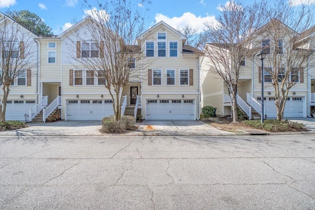 5561 Taylors Walke Ln, Virginia Beach, VA 23462 - view of front of property featuring stairs, driveway, and an attached garage
