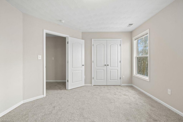 5561 Taylors Walke Ln, Virginia Beach, VA 23462 - unfurnished bedroom featuring carpet flooring and a closet