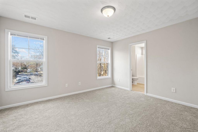 5561 Taylors Walke Ln, Virginia Beach, VA 23462 - unfurnished bedroom with carpet and connected bathroom