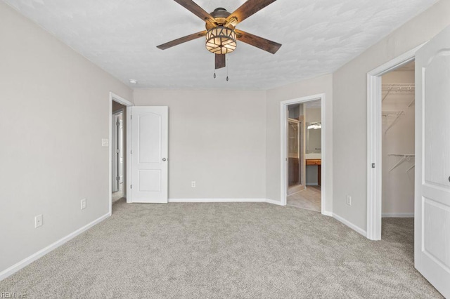 5561 Taylors Walke Ln, Virginia Beach, VA 23462 - unfurnished bedroom featuring a spacious closet, carpet floors, a closet, connected bathroom, and a ceiling fan