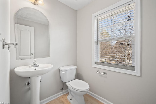 5561 Taylors Walke Ln, Virginia Beach, VA 23462 - half bathroom featuring plenty of natural light and wood finished floors
