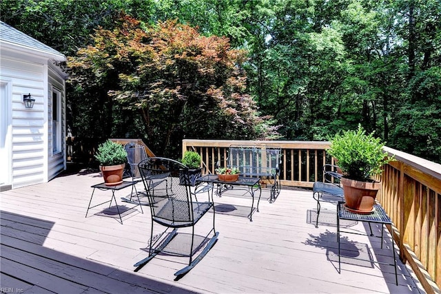 8265 Wrenfield Dr, Williamsburg, VA 23188 - wooden deck with outdoor dining space