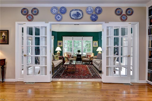 8265 Wrenfield Dr, Williamsburg, VA 23188 - living room featuring crown molding and wood finished floors