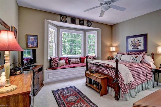 8265 Wrenfield Dr, Williamsburg, VA 23188 - bedroom with light colored carpet, multiple windows, and ceiling fan