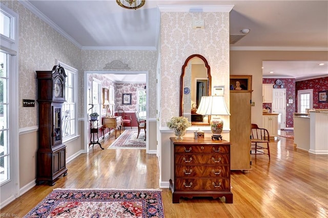 8265 Wrenfield Dr, Williamsburg, VA 23188 - foyer entrance with wallpapered walls, plenty of natural light, light wood-style flooring, and ornamental molding