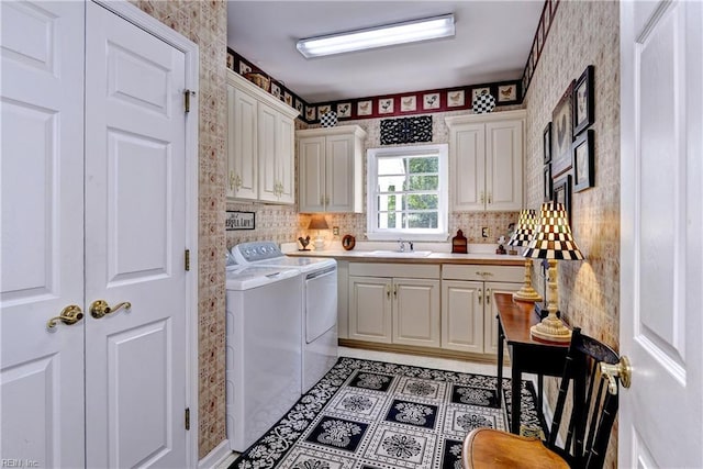 8265 Wrenfield Dr, Williamsburg, VA 23188 - washroom with cabinet space, washing machine and dryer, and wallpapered walls