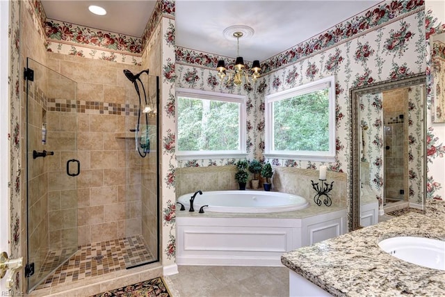 8265 Wrenfield Dr, Williamsburg, VA 23188 - bathroom featuring a garden tub, a stall shower, vanity, a chandelier, and tile patterned flooring