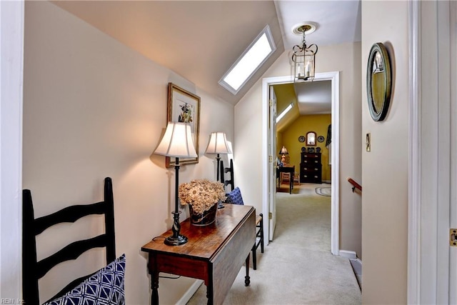 8265 Wrenfield Dr, Williamsburg, VA 23188 - hall with light carpet, lofted ceiling, and a skylight