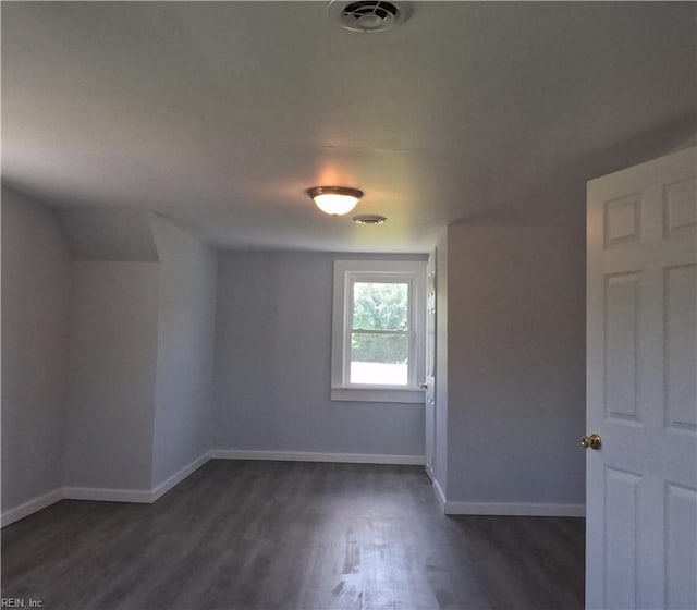 7276 Griffin Rd, Gloucester, VA 23061 - spare room featuring dark wood-style flooring and baseboards