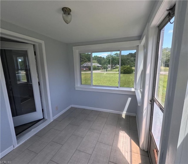 7276 Griffin Rd, Gloucester, VA 23061 - unfurnished sunroom with plenty of natural light