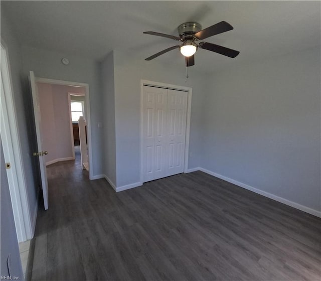 7276 Griffin Rd, Gloucester, VA 23061 - unfurnished bedroom featuring dark wood-style floors, a closet, and a ceiling fan