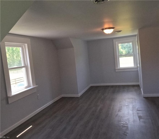 7276 Griffin Rd, Gloucester, VA 23061 - empty room with dark wood finished floors and healthy amount of natural light
