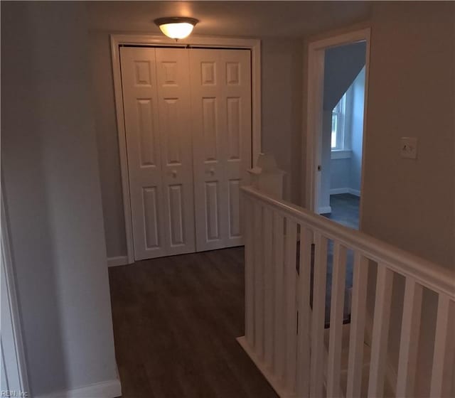 7276 Griffin Rd, Gloucester, VA 23061 - corridor with dark wood finished floors and baseboards