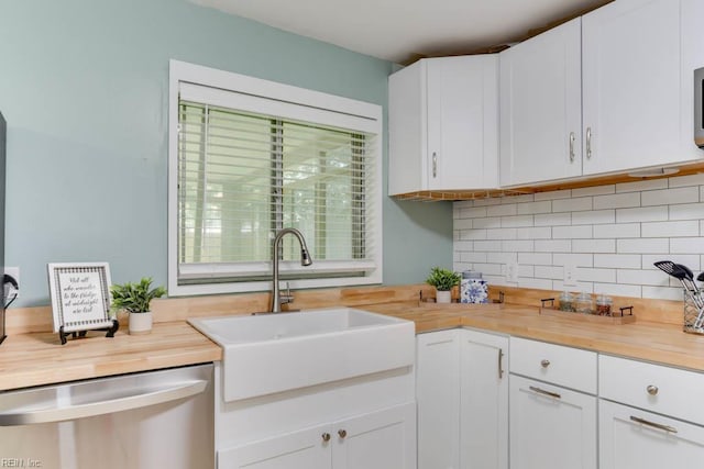 331 Silina Ct, Virginia Beach, VA 23452 - kitchen featuring wooden counters, stainless steel dishwasher, backsplash, and white cabinets