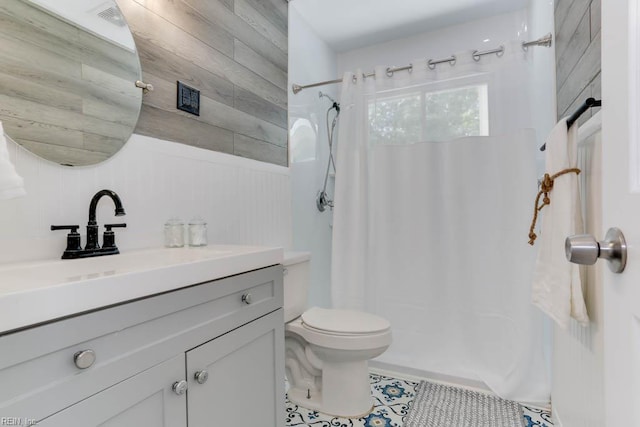 331 Silina Ct, Virginia Beach, VA 23452 - full bathroom featuring vanity, wooden walls, and tile patterned flooring