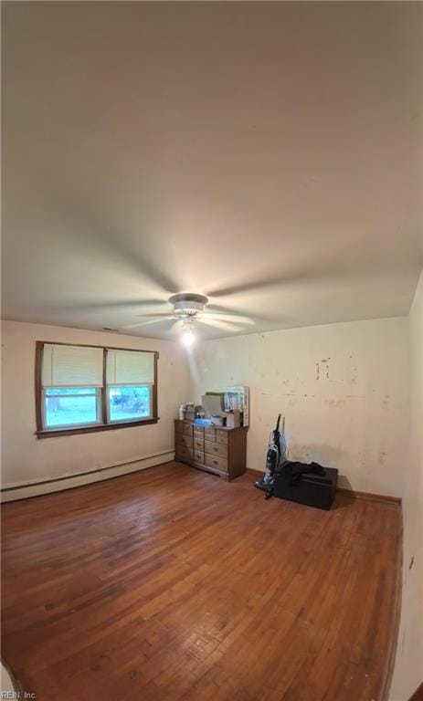 3244 Pruden Blvd, Suffolk, VA 23434 - additional living space with wood finished floors, a ceiling fan, and a baseboard heating unit