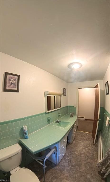 3244 Pruden Blvd, Suffolk, VA 23434 - bathroom with tile walls, a wainscoted wall, and vanity