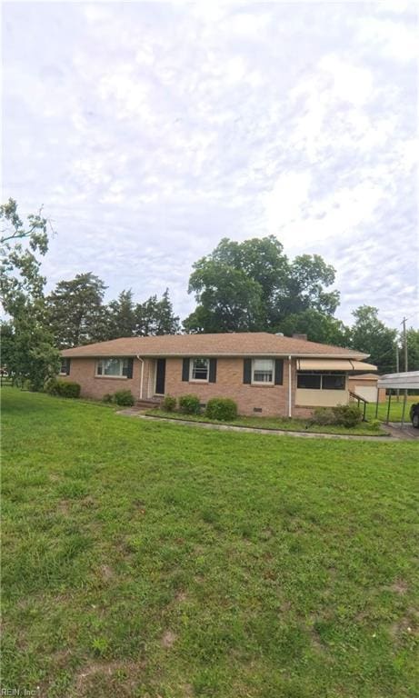 3244 Pruden Blvd, Suffolk, VA 23434 - ranch-style house featuring a front lawn and brick siding