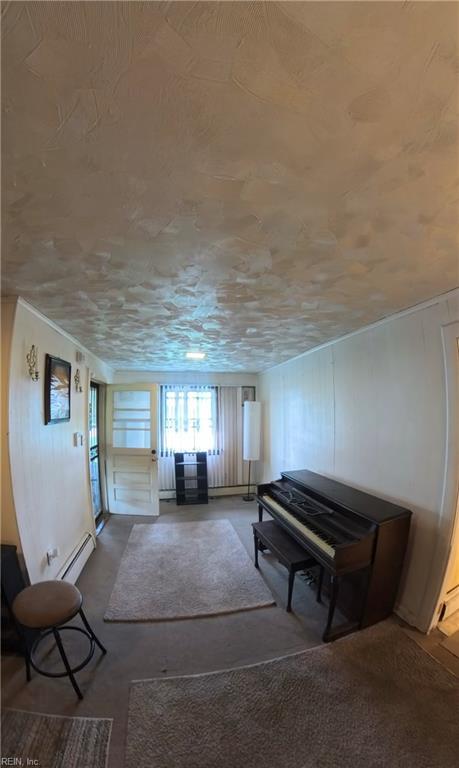3244 Pruden Blvd, Suffolk, VA 23434 - sitting room with a baseboard heating unit and carpet flooring