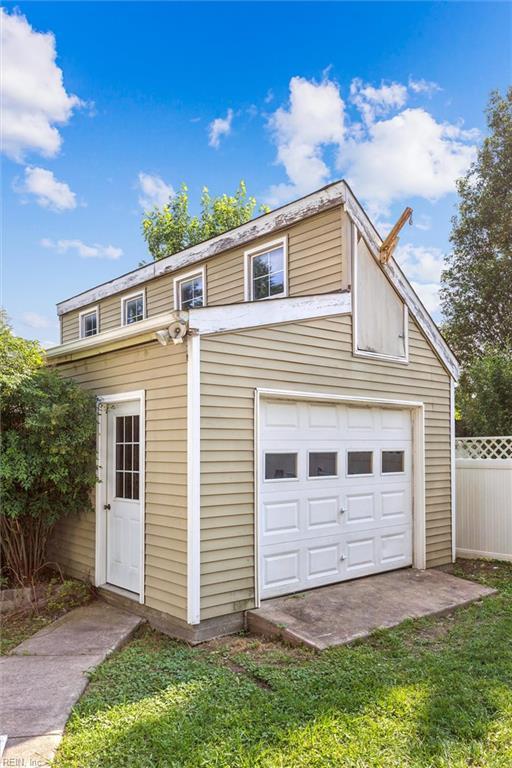 102 Canvasback Trl, Newport News, VA 23602 - view of front of home with an outdoor structure and a garage