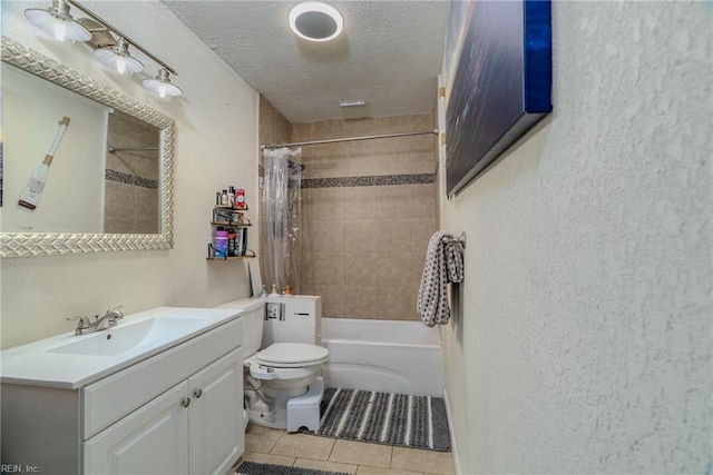325 E Lorengo Ave, Norfolk, VA 23503 - bathroom featuring tile patterned floors, vanity, shower / bath combo with shower curtain, and a textured ceiling