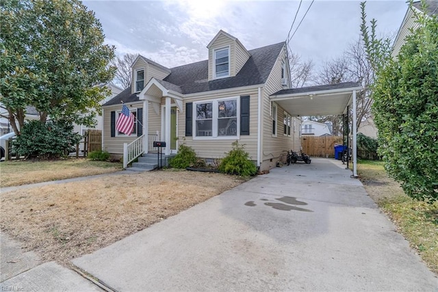 325 E Lorengo Ave, Norfolk, VA 23503 - cape cod-style house featuring driveway, a carport, crawl space, and a shingled roof