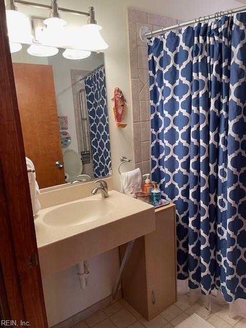 3225 Sandfiddler Rd, Virginia Beach, VA 23456 - full bathroom featuring tile patterned flooring and a shower with shower curtain