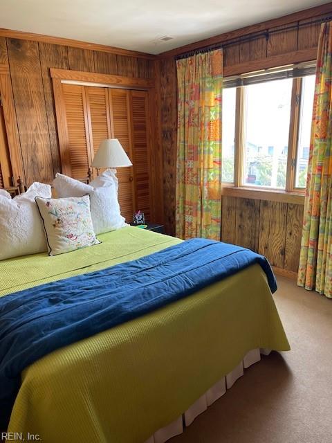 3225 Sandfiddler Rd, Virginia Beach, VA 23456 - carpeted bedroom with wooden walls