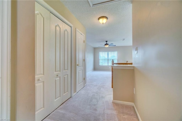 307 Melrose Ct, Suffolk, VA 23434 - hall with light colored carpet and a textured ceiling