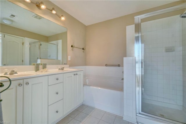 307 Melrose Ct, Suffolk, VA 23434 - bathroom with a stall shower, a garden tub, double vanity, and tile patterned flooring