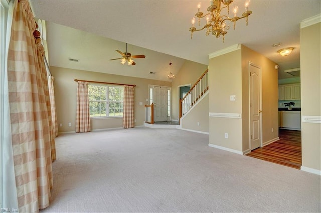 307 Melrose Ct, Suffolk, VA 23434 - unfurnished living room featuring carpet floors, a chandelier, stairway, a ceiling fan, and lofted ceiling