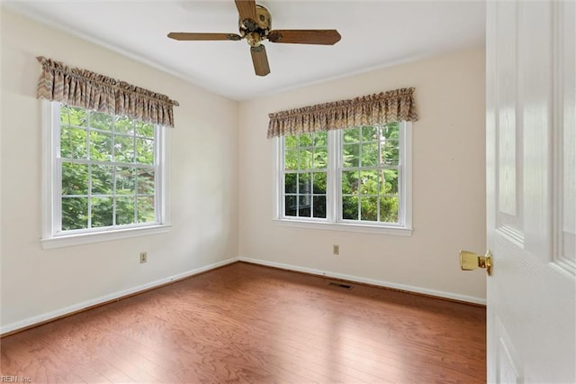 4 Everett Dr, Newport News, VA 23602 - unfurnished room featuring wood finished floors, healthy amount of natural light, and a ceiling fan