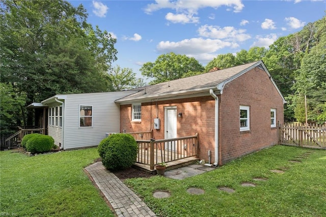 4 Everett Dr, Newport News, VA 23602 - rear view of house with brick siding and a deck